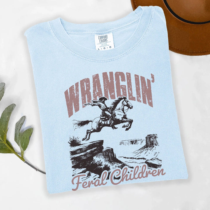 Wranglin’ Feral Children T-Shirt | Funny Western Mom Shirt | Country Mama Tee | Parenting Humor Graphic Tee | Chaos Coordinator Shirt